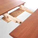 Scandinavian extendable teak dining table for 4/8 people.