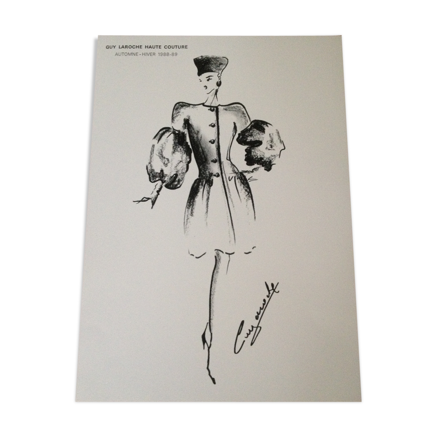 Nice illustration of mode accompanied by a press photograph by guy laroche