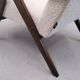 Fauteuil modèle b 310 var en boucle ivoire 1960