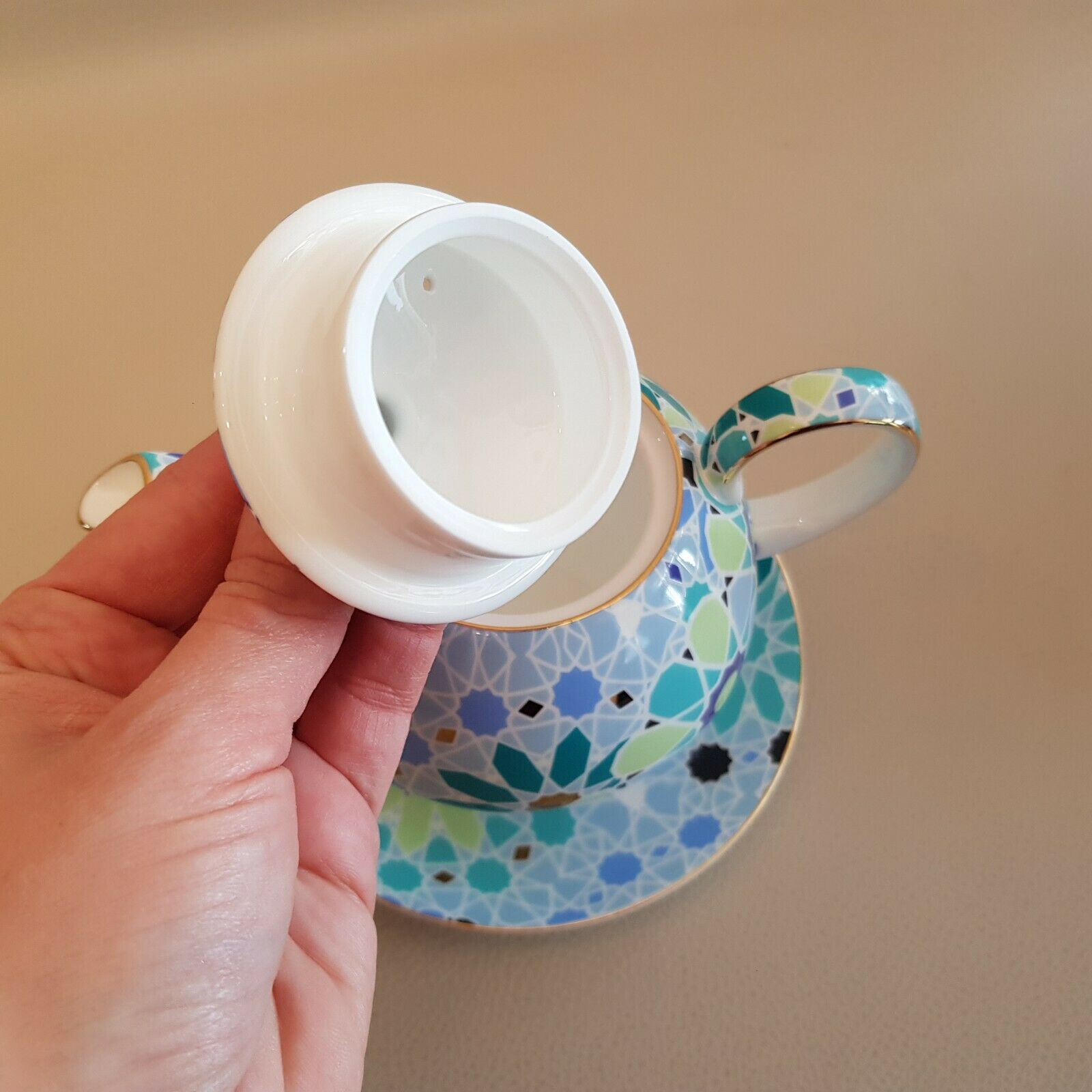 Teapot geometric decoration blue golden green