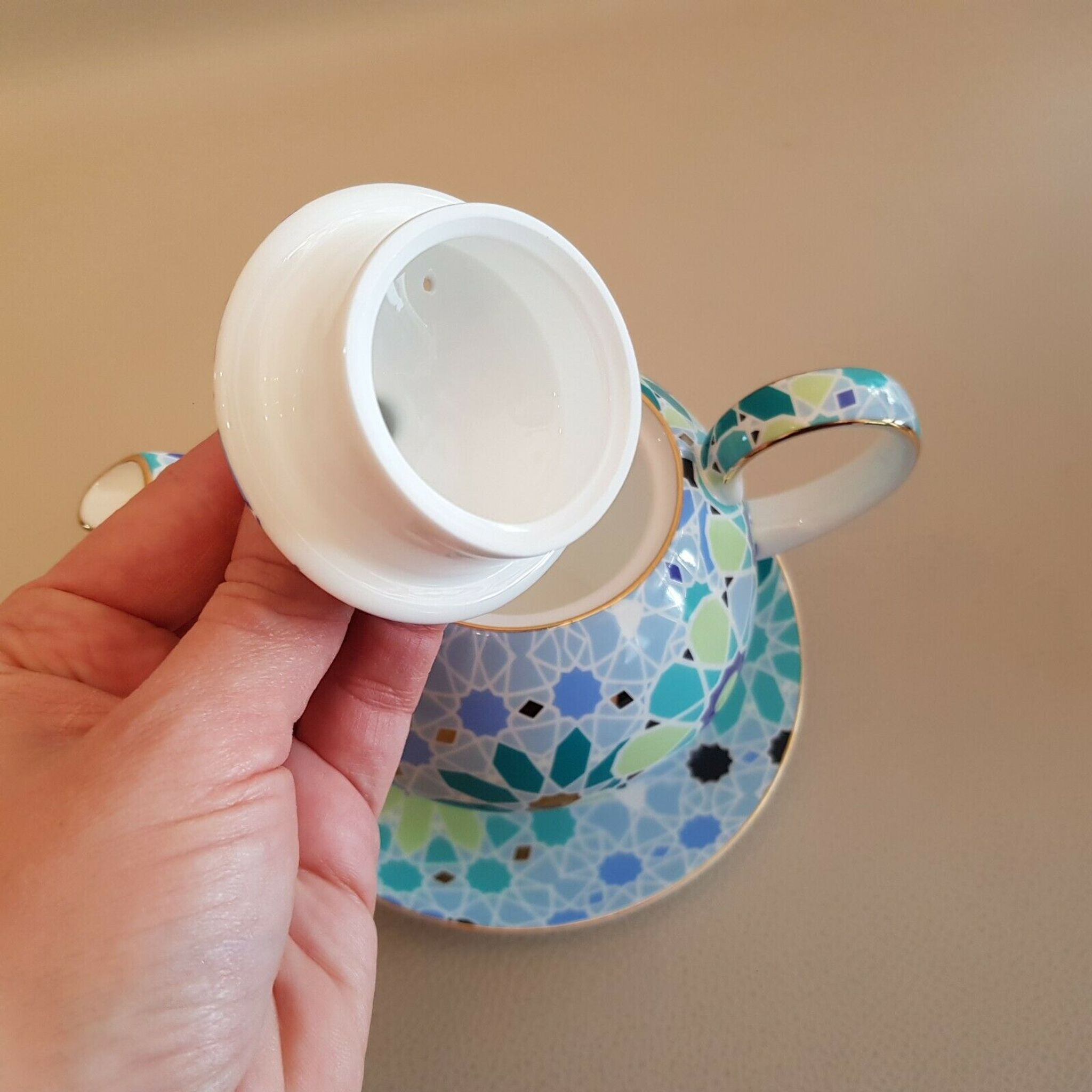 Teapot geometric decoration blue golden green