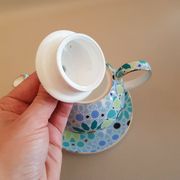 Teapot geometric decoration blue golden green