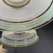 Set of 4 Art Deco pendant lights in frosted water green and gold.