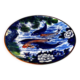 Decorative porcelain plate featuring a koi carp.