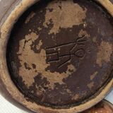 Old terracotta teapot