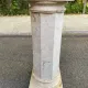 Natural stone pedestal column in beige marble, neoclassical style, 77cm.
