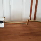 Golden articulated sconce