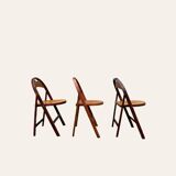 Set of 3 folding chairs in curved beech, circa 1930
