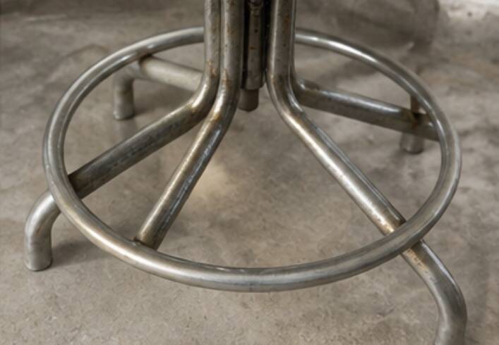 Title Vintage adjustable workshop chair – patinated metal & grey faux leather