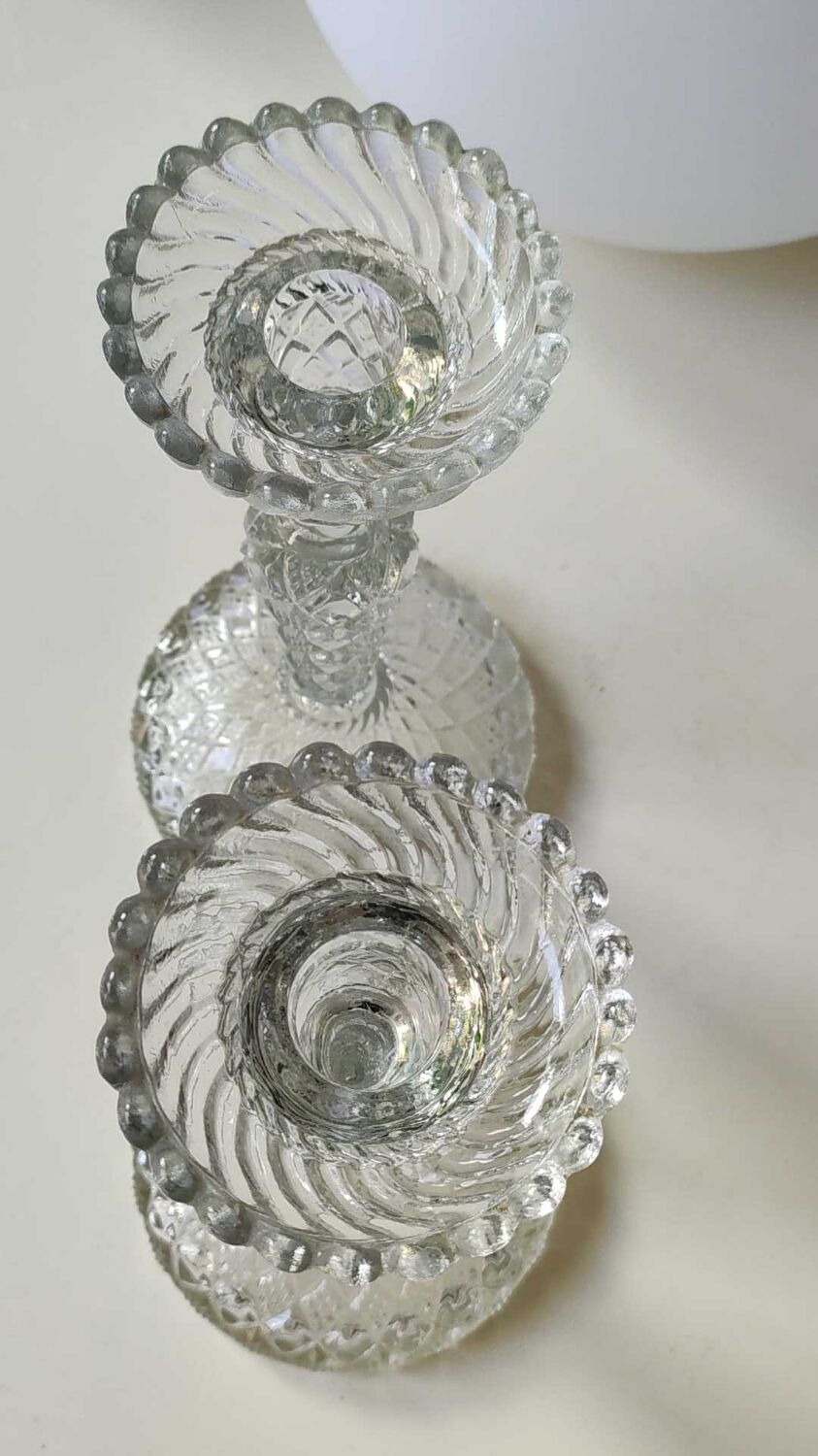 Pair of Bougeoirs flambeaux/Verrerie de Portieux, molded glass. Cross patterns, corolla shape