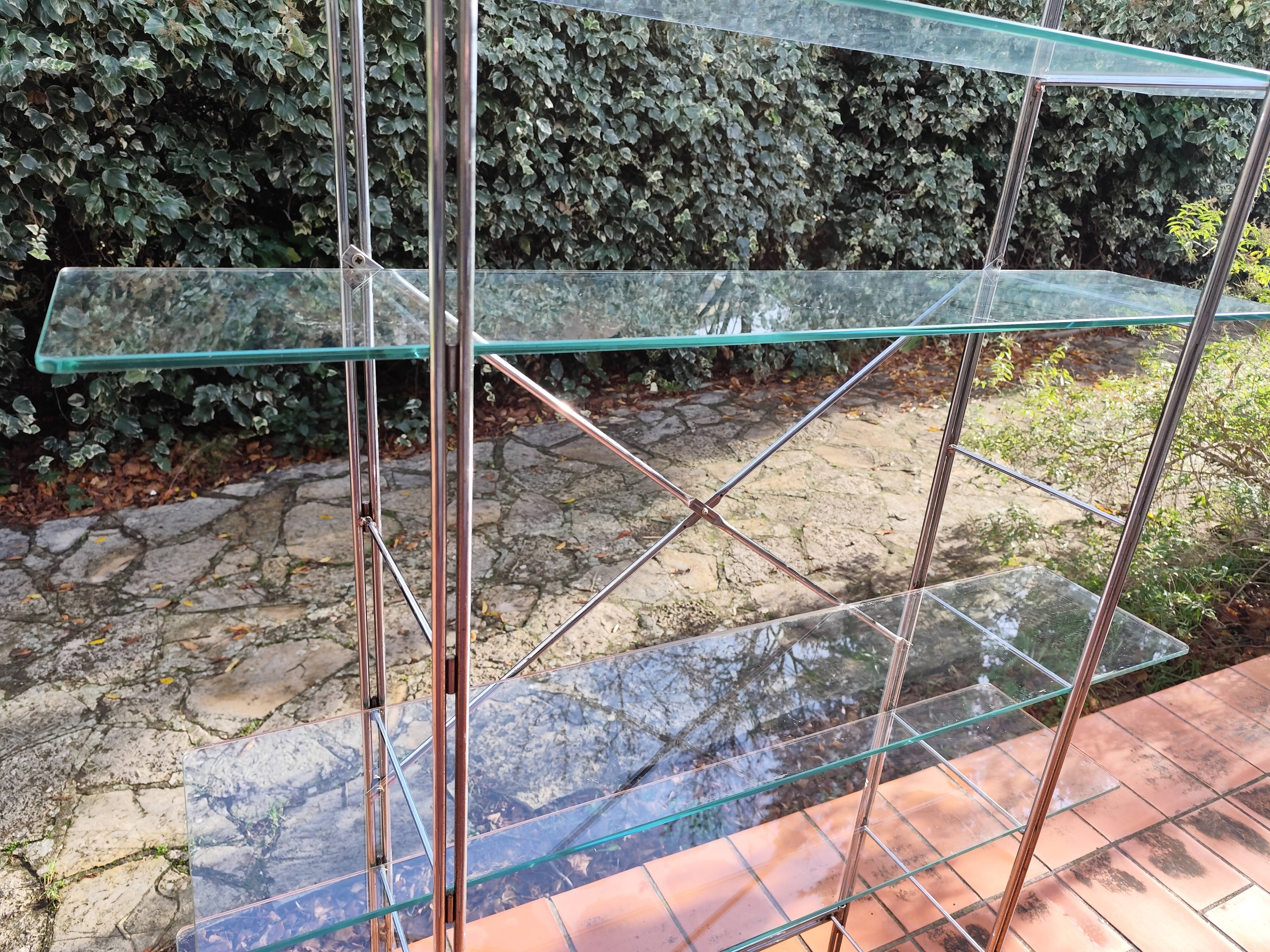 Modular metal chrome and vintage glass shelves from the 1970s.