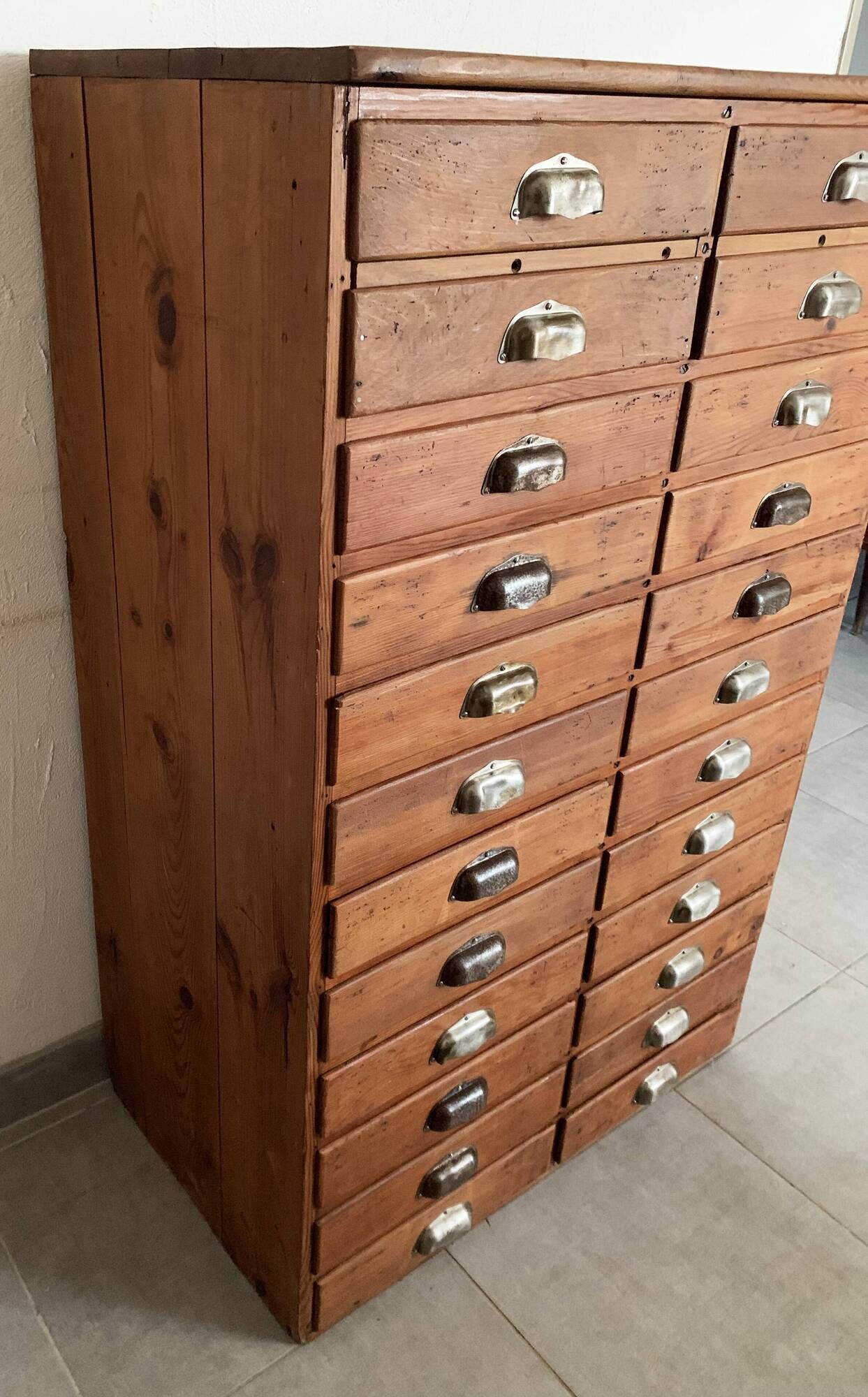 Old apothecary trade furniture in vintage wood 24 drawers.