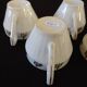 Set of six Art Deco white fine porcelain coffee cups and saucers