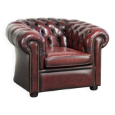 Chic lived-in English chesterfield club armchair in a timeless red colour