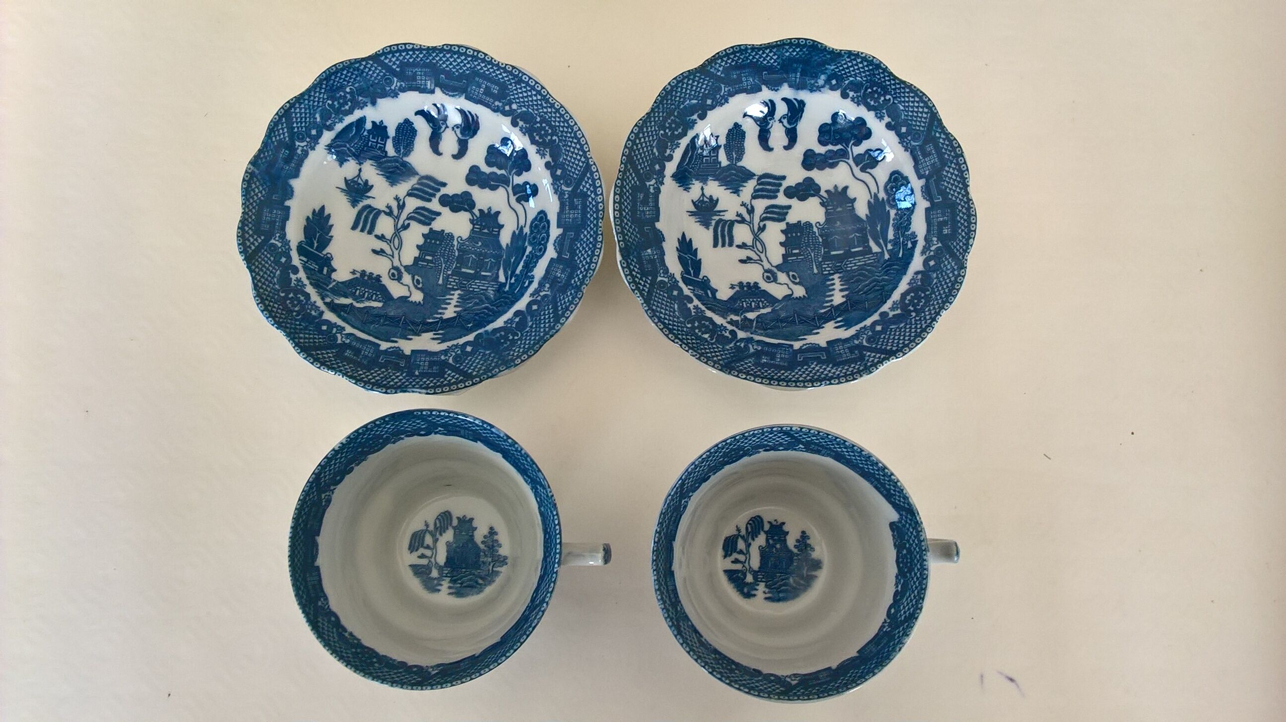 Two Blue Willow porcelain tea cups