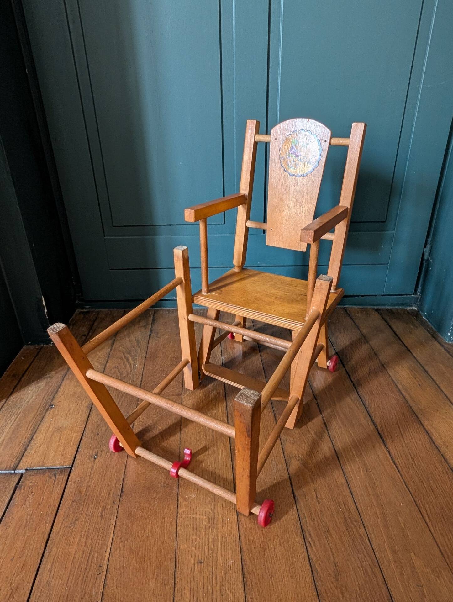 Doll high chair in wood – 1970s, foldable and on wheels