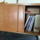 Vintage storage cabinet sliding doors feet compass