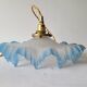 Suspension in opaline