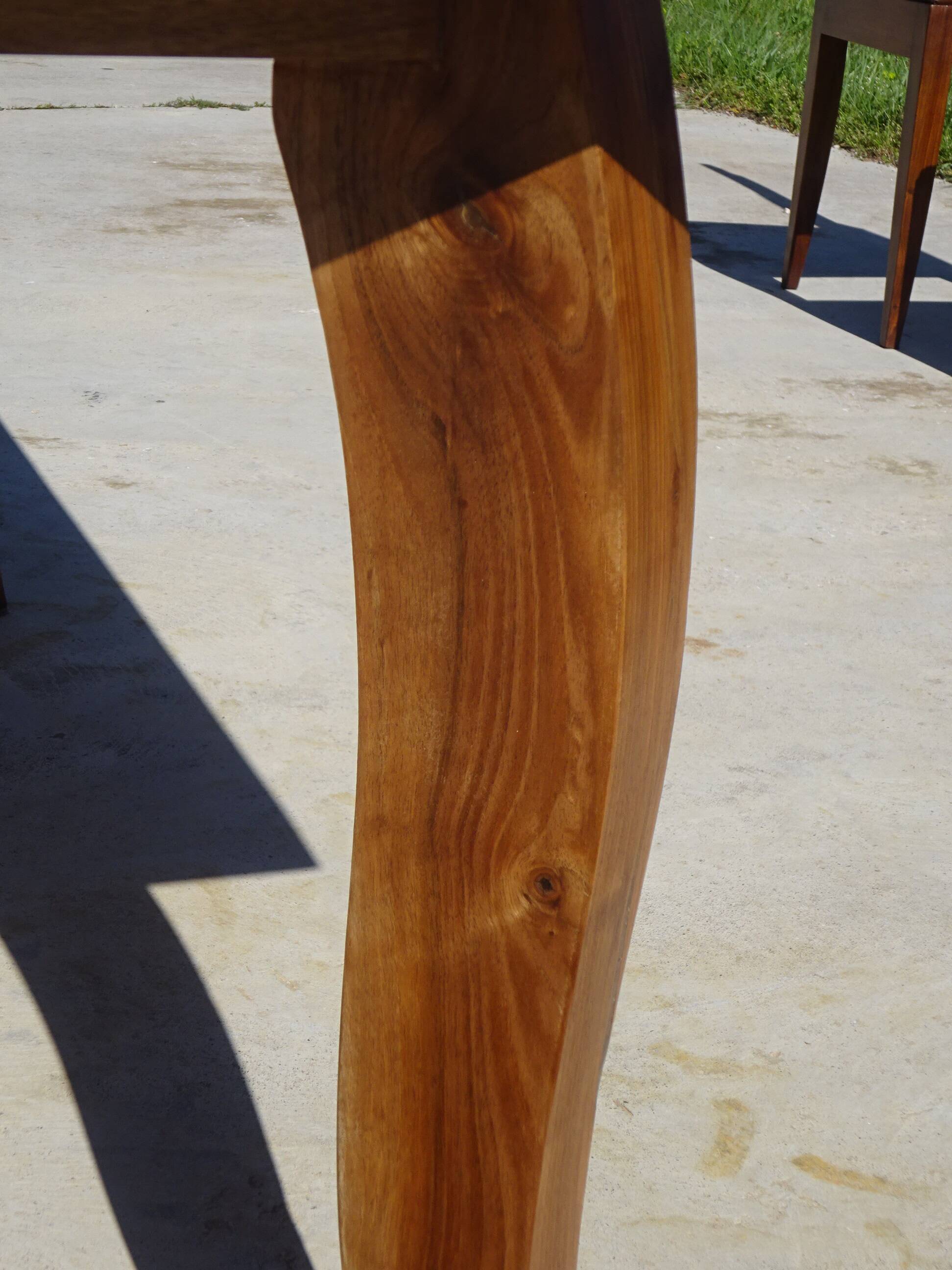 Antique solid walnut table with marquetry and extensions.