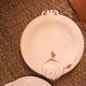 Set of 8 Longwy earthenware fish plates in powder pink