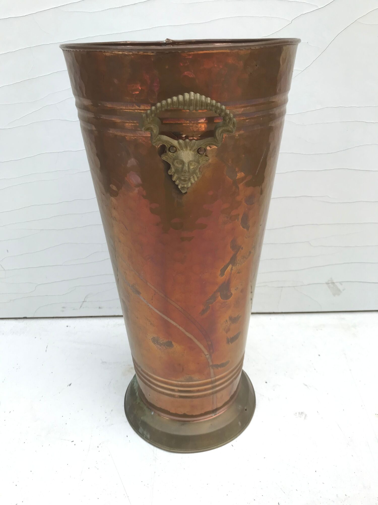 Ancient copper umbrella door and handles in brass