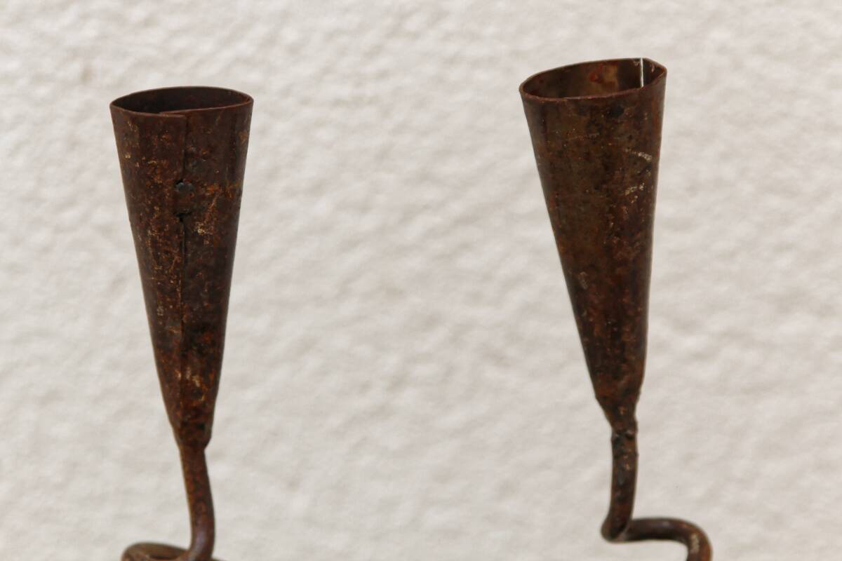 Pair of wrought iron spiral candlesticks