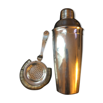 Silver metal shaker and colander