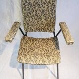 2 small black and white armchairs