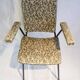 2 small black and white armchairs