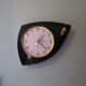 Black formica wall clock, Flash Transistor brand, Flavia model