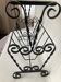 Wrought iron and ceramic magazine rack