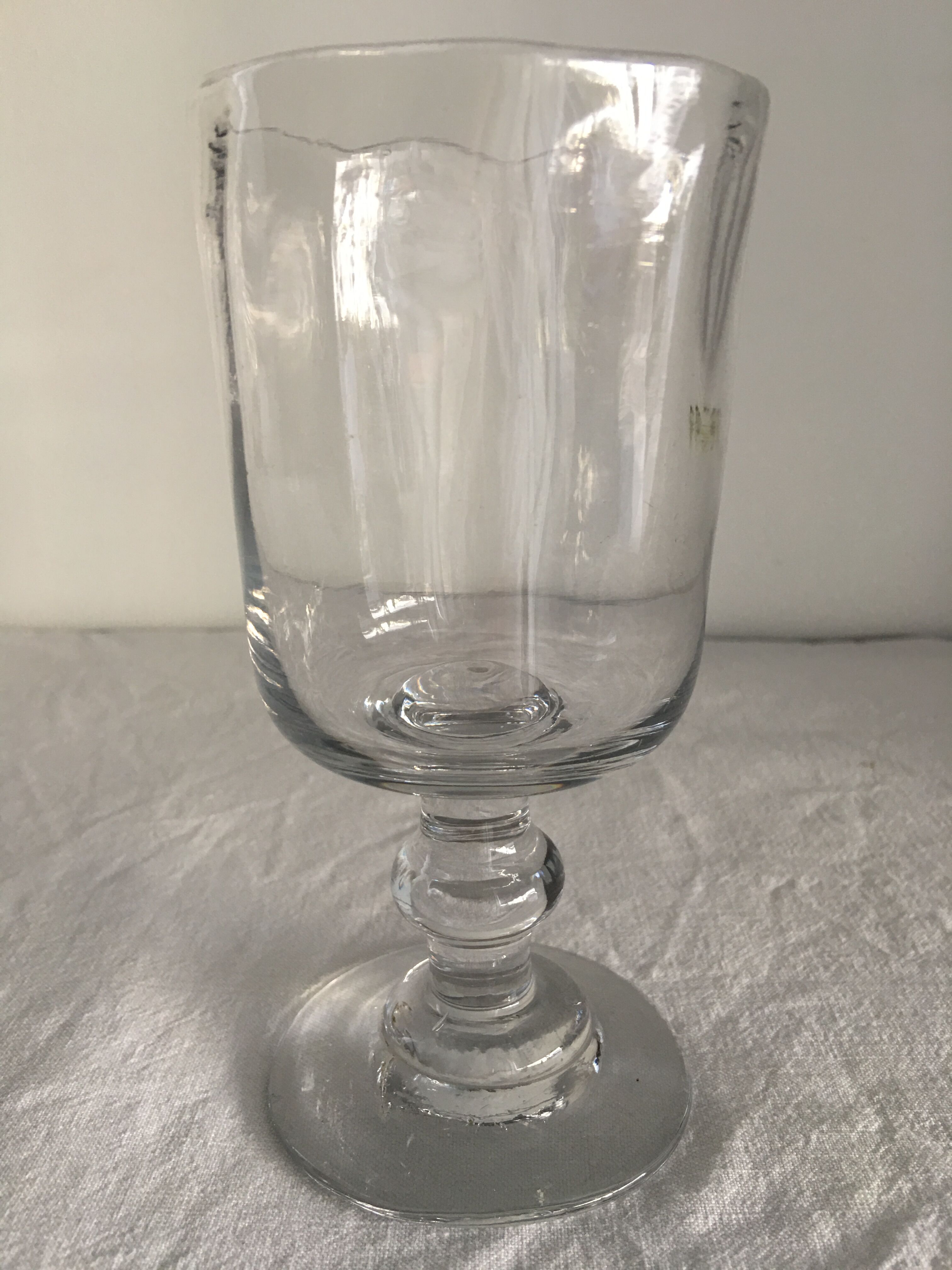 Glass on foot - blown glass bubble late nineteenth early twentieth