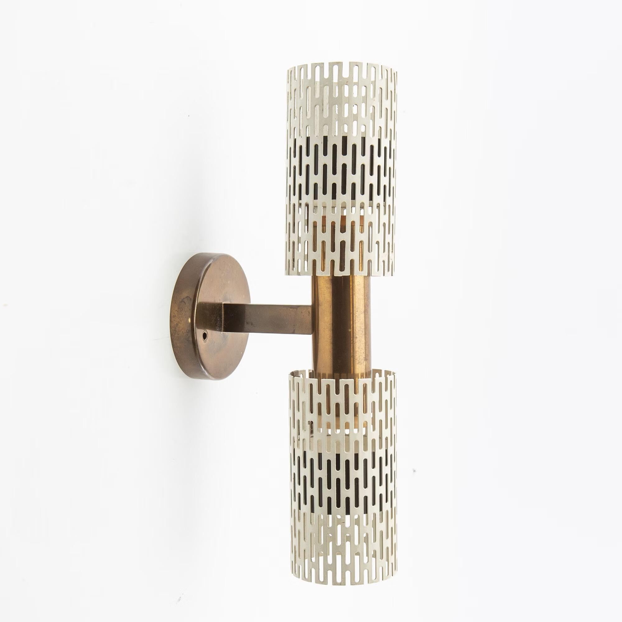 Rare wall light by Harald Notini Model No 11262 for Bohlmarks, 1950.