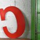 Industrial letter "C" in red metal