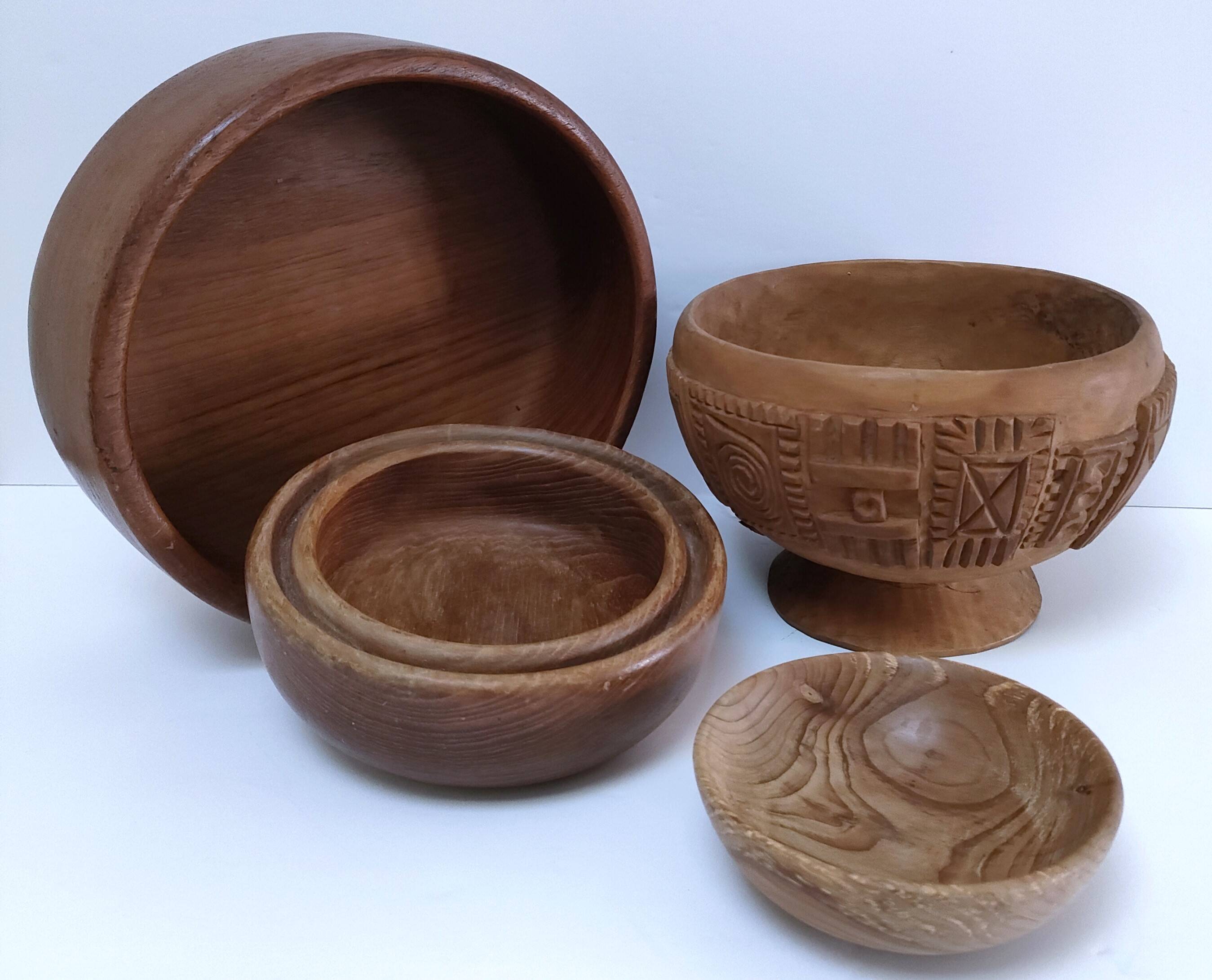 four vintage solid wood bowls