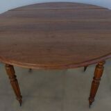 Antique round table with shutters in walnut wood on casters