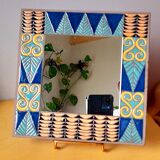 Enamelled lava mirror