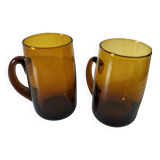 Pair of vintage amber glass tankards