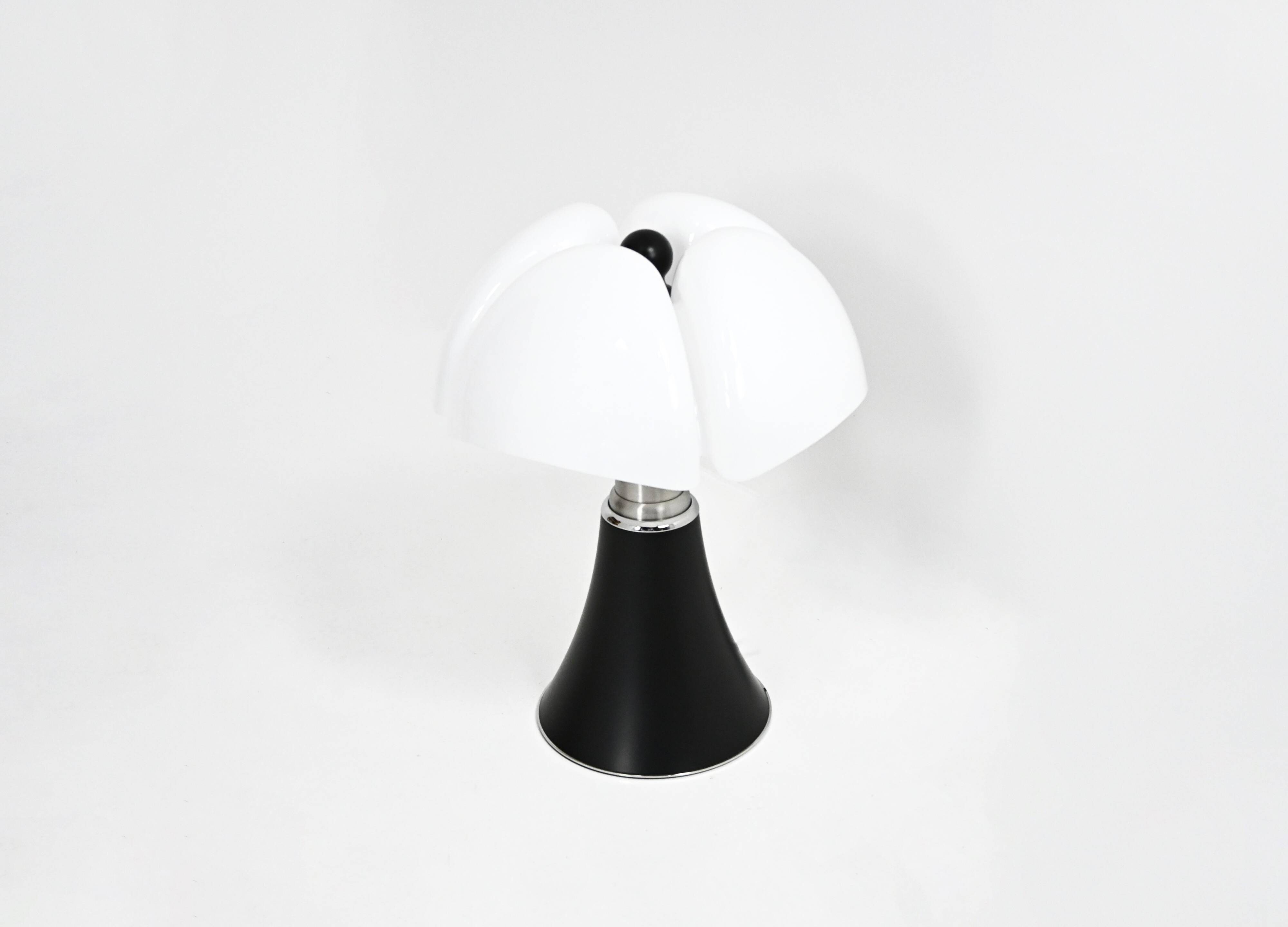 Black "Pipistrello" table lamp by Gae Aulenti for Martinelli.