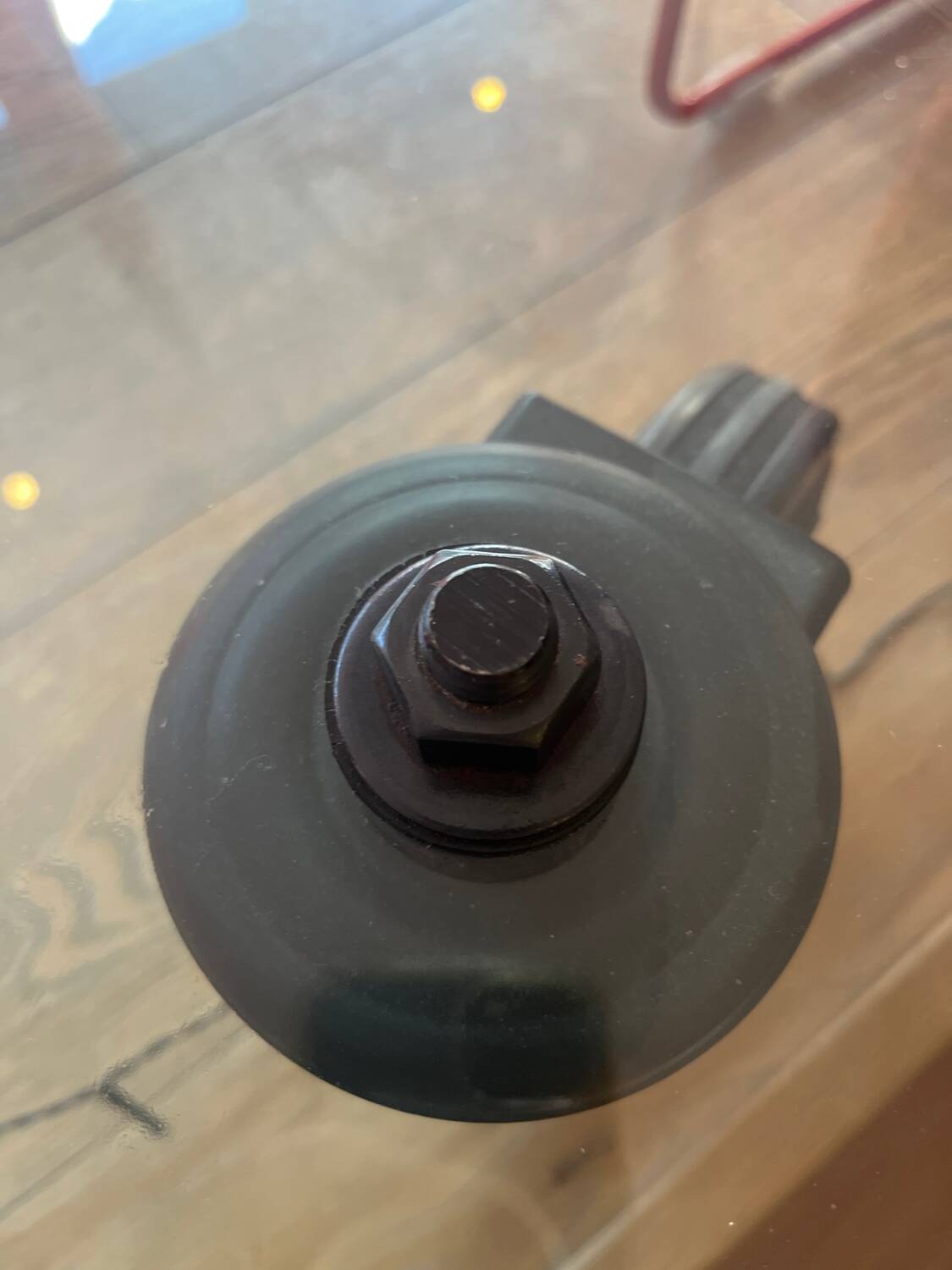 Gae Aulenti coffee table for Fontana Arte, transparent glass top with black cast iron supports, 1980s.