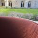 Two cognac-colored swivel chairs made of fiberglass from the 1970s