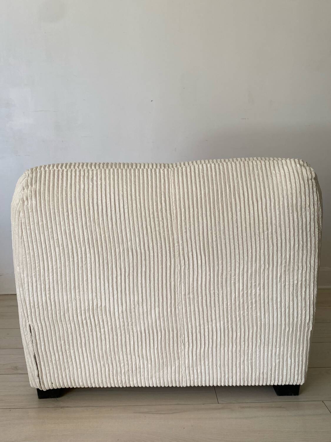 White corduroy armchair