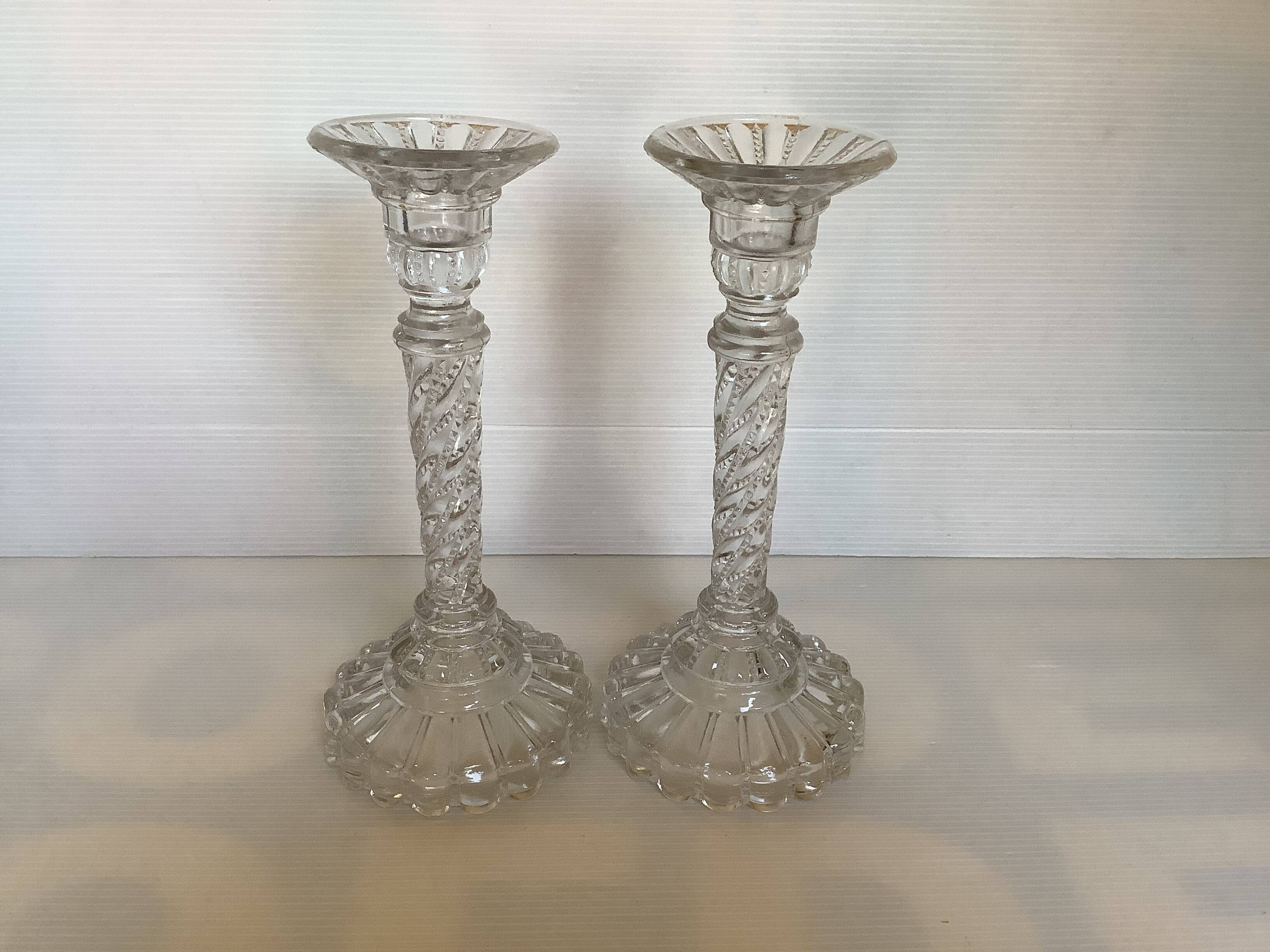Pair of old twisted candlesticks with diamond tips.