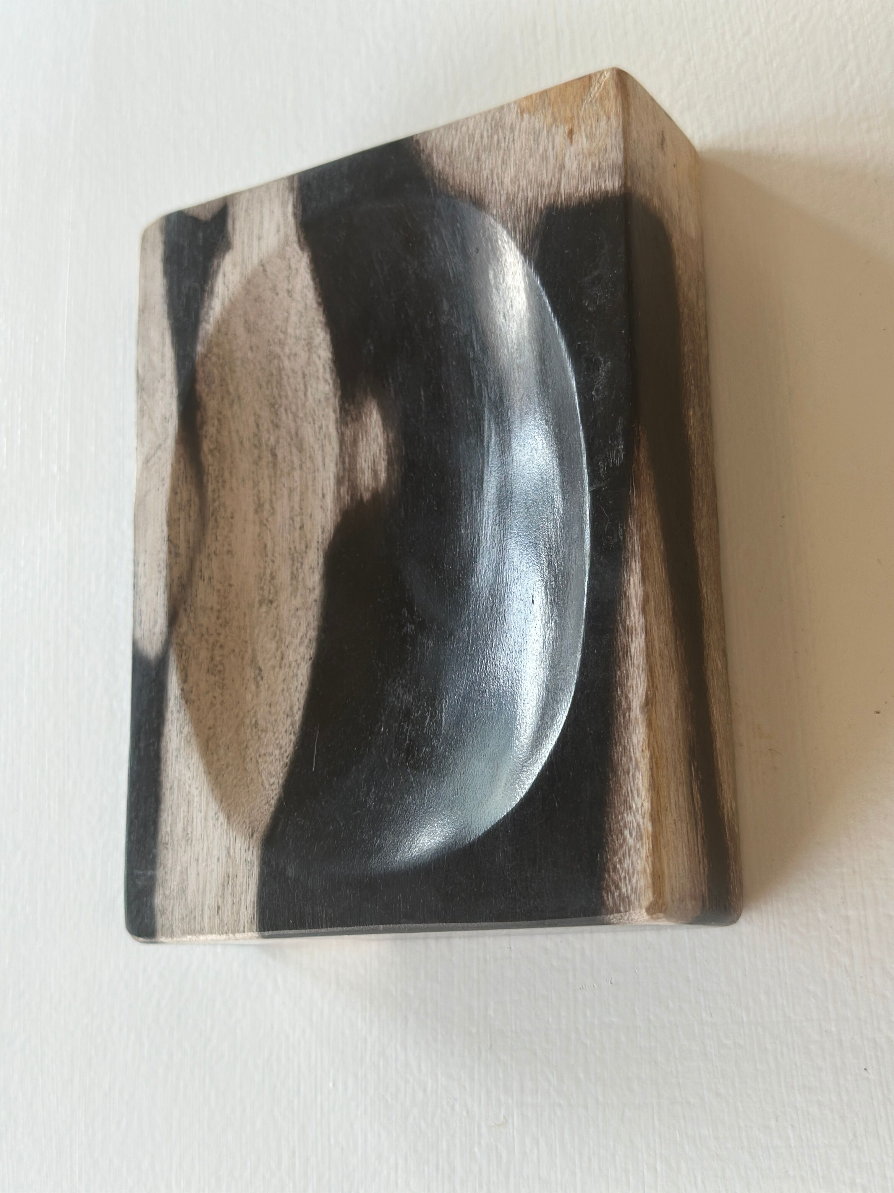 Symmetrical multicolored petrified wood soap dish