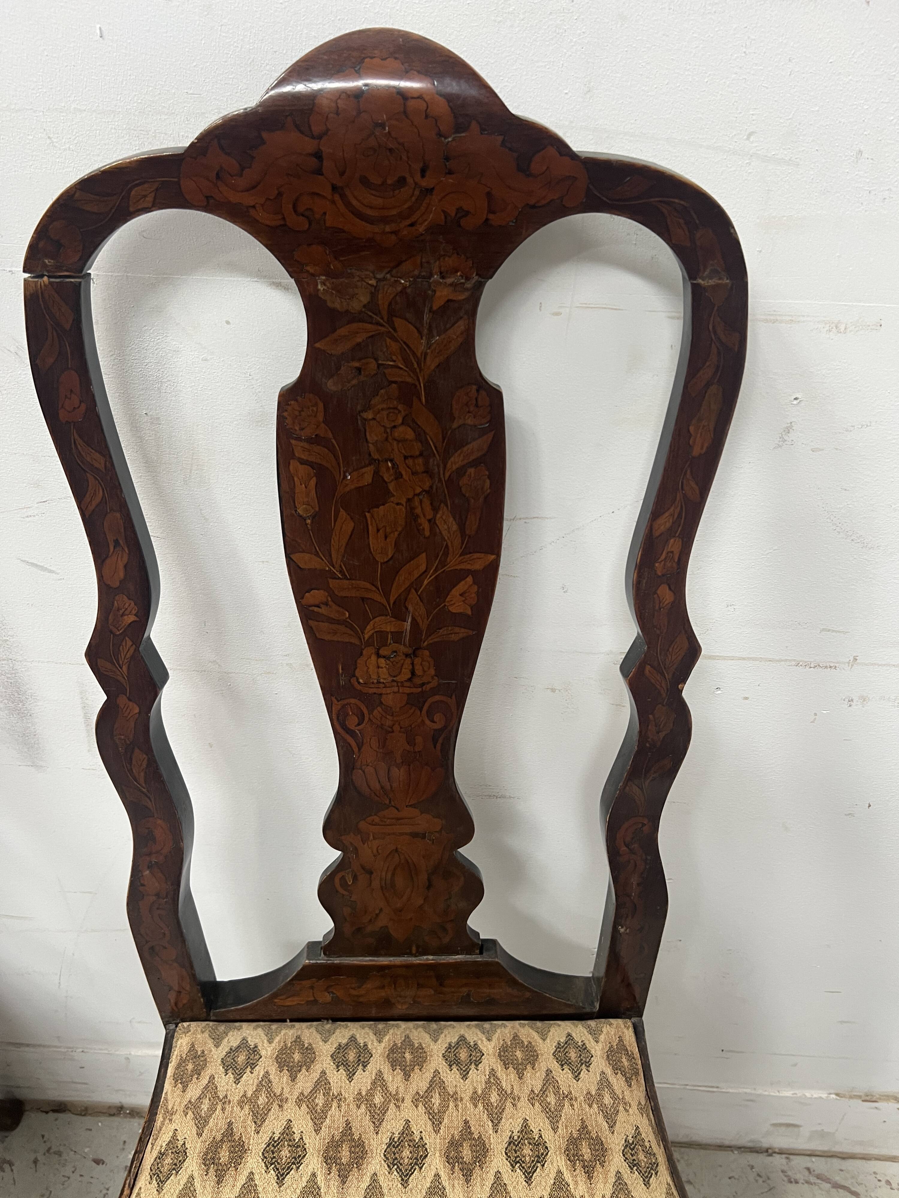 Set of eight Dutch marquetry chairs from the 19th century.