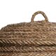 Hand-woven laundry basket in natural rush