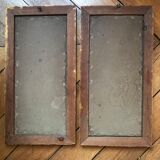 Two old paintings of flowers and gilded frames
