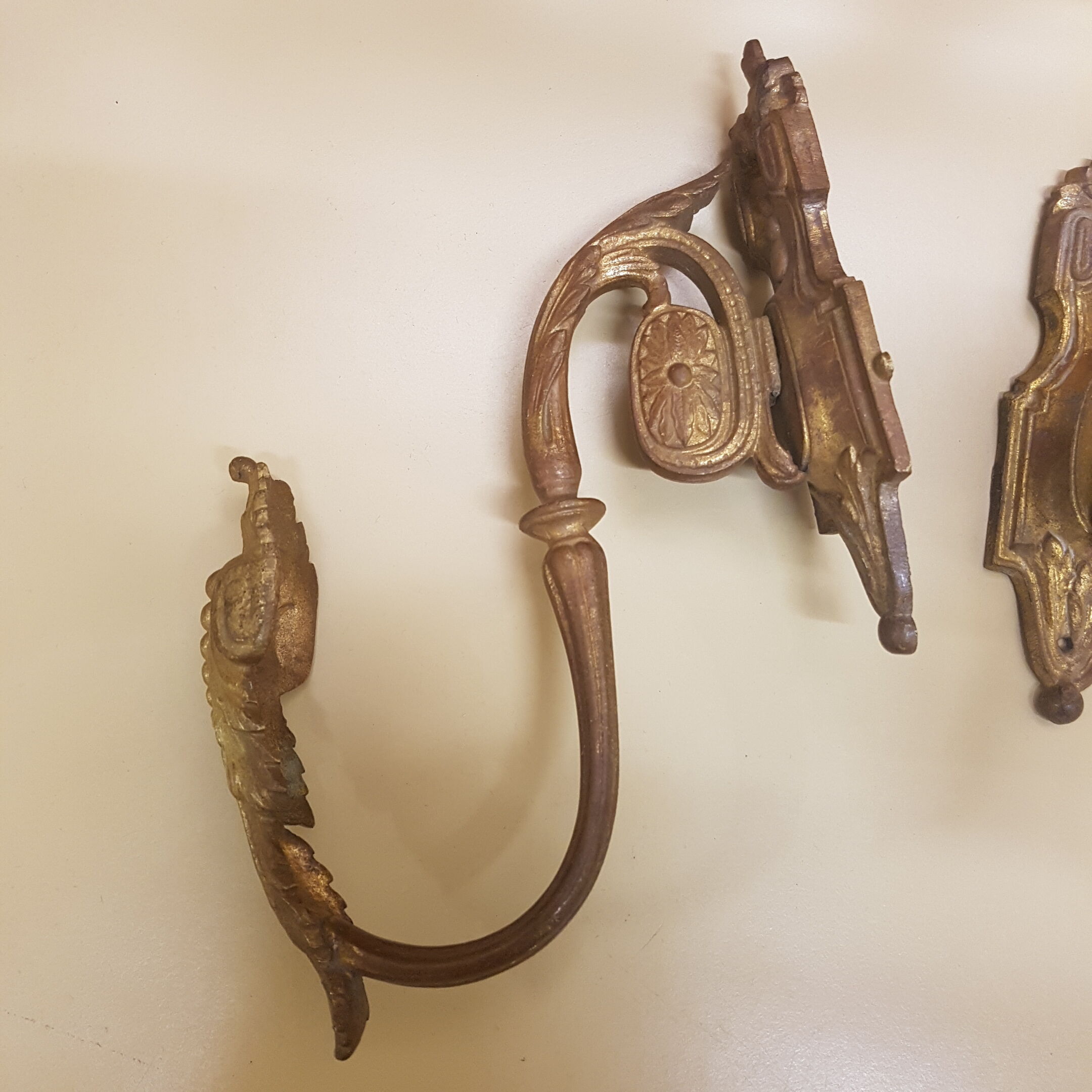 Pair of gilt bronze pegs