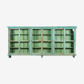 Wooden showcase with turquoise patina