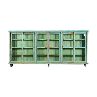 Wooden showcase with turquoise patina